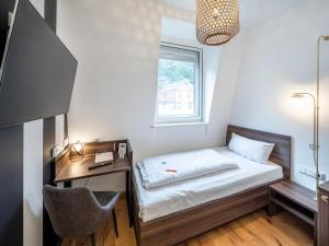 Postel nebo postele na pokoji v ubytování acor Boutique Hotel
