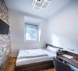 Postel nebo postele na pokoji v ubytování acor Boutique Hotel