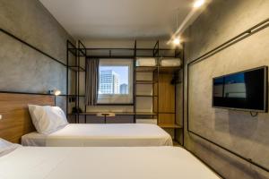Katil atau katil-katil dalam bilik di ibis Ribeirao Preto Vila do Golf