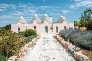 Zahrada ubytování Trulli Gianpaolo - Luxury Villa