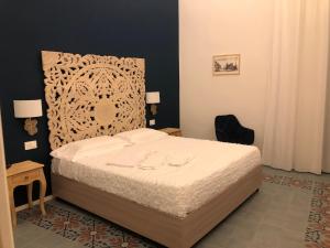 Cama ou camas em um quarto em Ursino's Luxury