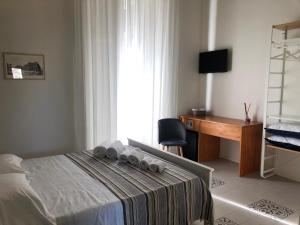 Cama ou camas em um quarto em Ursino's Luxury