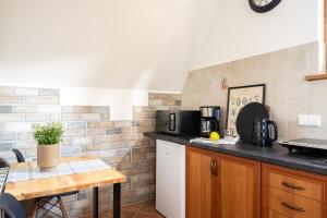 Kuchyňa alebo kuchynka v ubytovaní Apartament Tatry #dobrylot + 5 fotografií