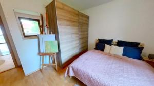Posteľ alebo postele v izbe v ubytovaní Holiday house Liptovský Ján