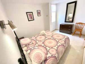 Postel nebo postele na pokoji v ubytování Bungalow El Cortijo + 19 fotografií