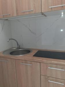 Kuchyňa alebo kuchynka v ubytovaní APARTAMENTY CENTRUM PIŁSUDSKIEGO