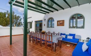 A balcony or terrace at Pico Partido villa heated pool