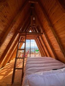 Postelja oz. postelje v sobi nastanitve Glamping Valley Barichara