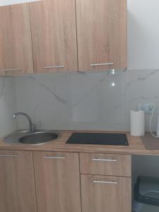 Kuchyňa alebo kuchynka v ubytovaní APARTAMENTY CENTRUM PIŁSUDSKIEGO