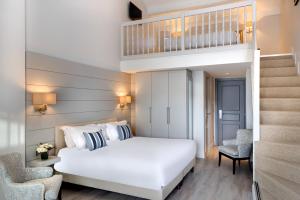 Cama ou camas em um quarto em La Bastide de Biot
