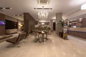 Area soggiorno di Class Hotel Rio Claro