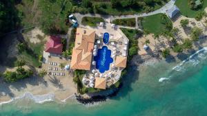 an aerial view of a resort on the beach at Royalton Grenada, An Autograph Collection All-Inclusive Resort in Bamboo