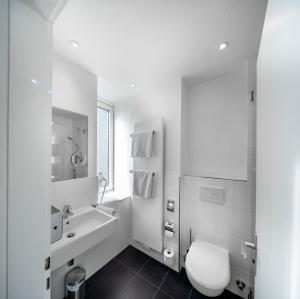 Koupelna v ubytování acor Boutique Hotel