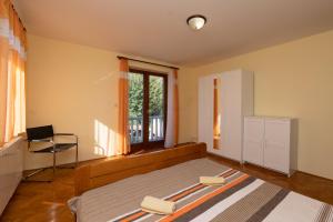 Ein Bett oder Betten in einem Zimmer der Unterkunft Apartment Lara