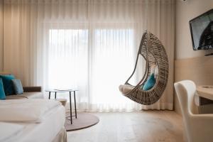 Postel nebo postele na pokoji v ubytování Hotel Wiesenhof