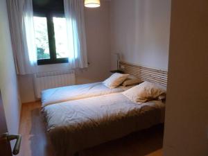 Postel nebo postele na pokoji v ubytování Tarter town center appartment by Renttarter