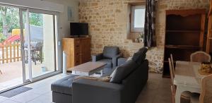 Posezení v ubytování L'OASIS DES MARAIS La maison du Marais