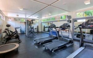 a gym with several treadmills and exercise bikes at Barreirinhas Gran Lençóis Flat Residence Mandacaru 506 Particular in Barreirinhas