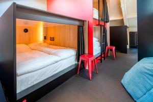 Säng eller sängar i ett rum på City Trip Hostels Amsterdam-Purmerend