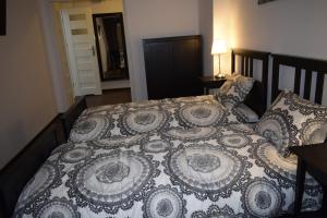 Posteľ alebo postele v izbe v ubytovaní Fiesta Apartament