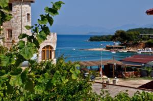 a view of the ocean from a building at Zace Studios in Ksamil