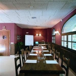 The business area and/or conference room at Hotel Can Blanc