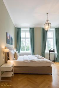 Postel nebo postele na pokoji v ubytování Parkview Boutique Apartments