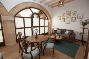 A seating area at Patios de la Riva