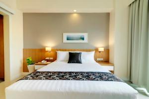 Katil atau katil-katil dalam bilik di Zerenity Hotel & Suites
