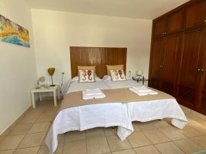 Postel nebo postele na pokoji v ubytování CALIMA Holiday House