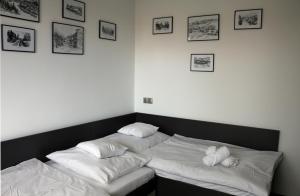 Posteľ alebo postele v izbe v ubytovaní Apartament W SERCU USTRONIA