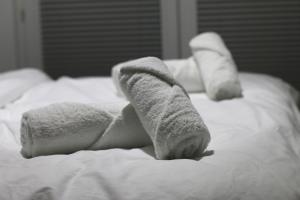 Posteľ alebo postele v izbe v ubytovaní Apartament W SERCU USTRONIA