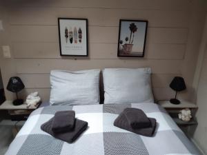 Postel nebo postele na pokoji v ubytování le loft