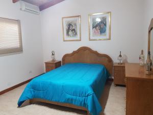מיטה או מיטות בחדר ב-La Deolinda
