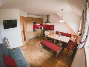 A kitchen or kitchenette at Appartements Macheiner