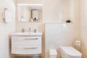 Koupelna v ubytování SOLU Apartment