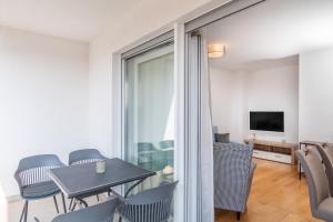 TV a/nebo společenská místnost v ubytování SOLU Apartment