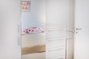 Postel nebo postele na pokoji v ubytování SOLU Apartment