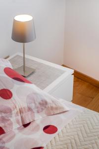 Postel nebo postele na pokoji v ubytování SOLU Apartment