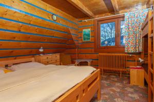 Postel nebo postele na pokoji v ubytování Apartman Bachledova dolina