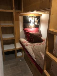 Ένα ή περισσότερα κρεβάτια σε δωμάτιο στο Les Appartements de Maé +72 φωτογραφίες