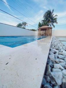 Swimmingpoolen hos eller tæt på MIAMI PARADISE
