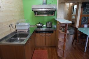 Eldhús eða eldhúskrókur á Ji Ji Farm Homestay