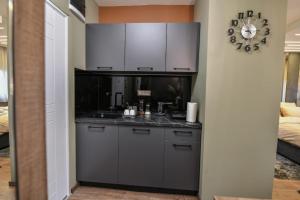 Kuchyň nebo kuchyňský kout v ubytování BANE APARTMANI 4.
