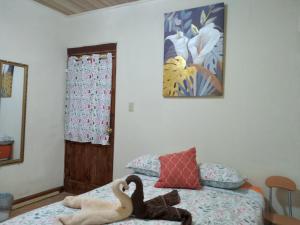 Postel nebo postele na pokoji v ubytování CreaDora