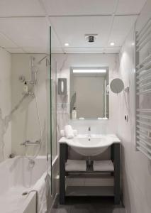 Kylpyhuone majoituspaikassa Best Western Alexandra