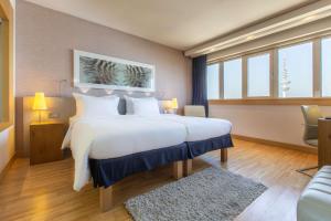 Llit o llits en una habitació de Radisson Blu Hotel, Hamburg