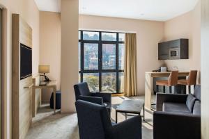 TV a/nebo společenská místnost v ubytování Radisson Serviced Apartments Antananarivo City Centre