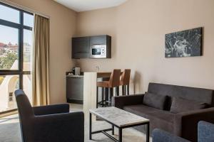 Posezení v ubytování Radisson Serviced Apartments Antananarivo City Centre