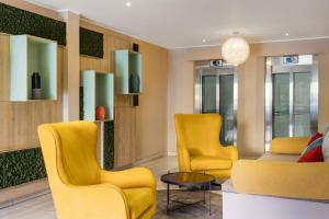 Posezení v ubytování Radisson Serviced Apartments Antananarivo City Centre